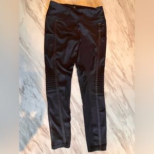 Vina Leggings size Medium Black with mesh and motto accents. Pockets.